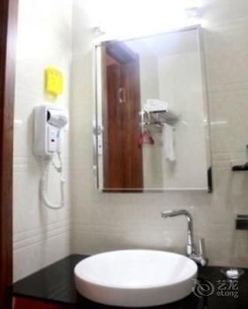 Hualian Business Hotel Shenyang Esterno foto